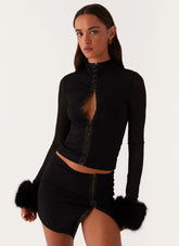 Top de manga larga con ribete de piel Tayanna - Negro