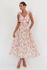 Vestido largo Madara con espalda de cordones y estampado floral color melocotón