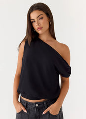Top con diseño "Stick Around" - Negro
