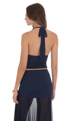 Top halter con cuello drapeado en azul marino
