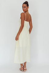 Maxivestido Honey Baby con cintura diagonal color mantequilla