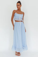 Top overlock Maidens con detalle de lazo azul nube