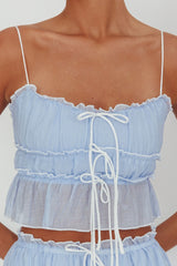 Top overlock Maidens con detalle de lazo azul nube