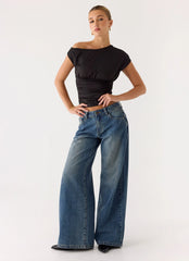 Vaqueros Neo de tiro bajo y pierna ancha - Lavado vintage azul blanqueado