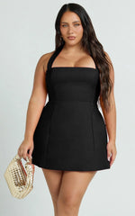 Minivestido Dante - Vestido con cuello halter, falda tulipán y lazo en color negro