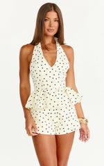 Top Seraphina - Top Peplum con Cuello V y Lunares Blancos