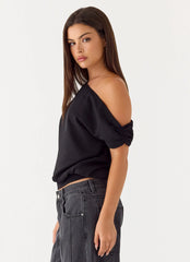 Top con diseño "Stick Around" - Negro