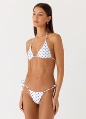 Top de bikini estilo halter Mommae - Lunares blancos